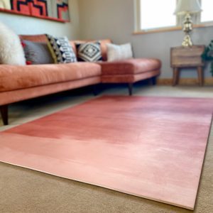Large tan and rust yoga mat in beautiful and peaceful living room